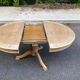 Extendable round dining table with central leg, renovated in raw wood, 20th century