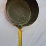 Lots of tinned copper kitchen utensils