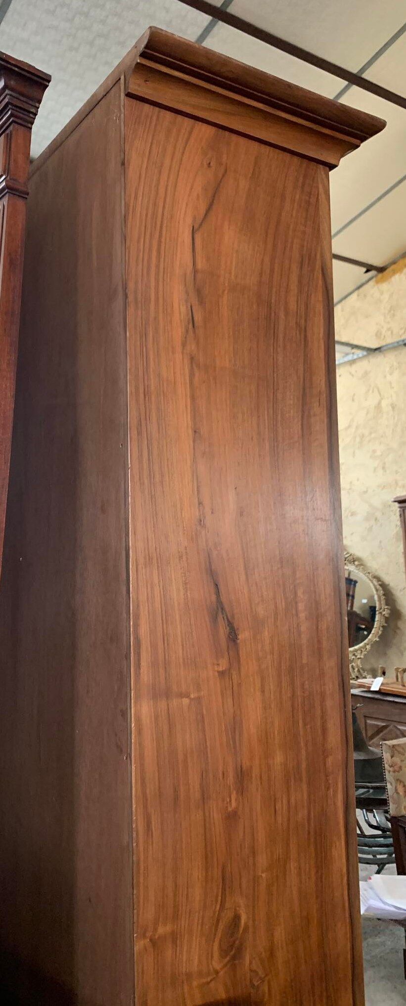 Bibus bookcase of walnut parquet with blonde patina