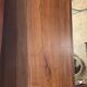 Bibus bookcase of walnut parquet with blonde patina