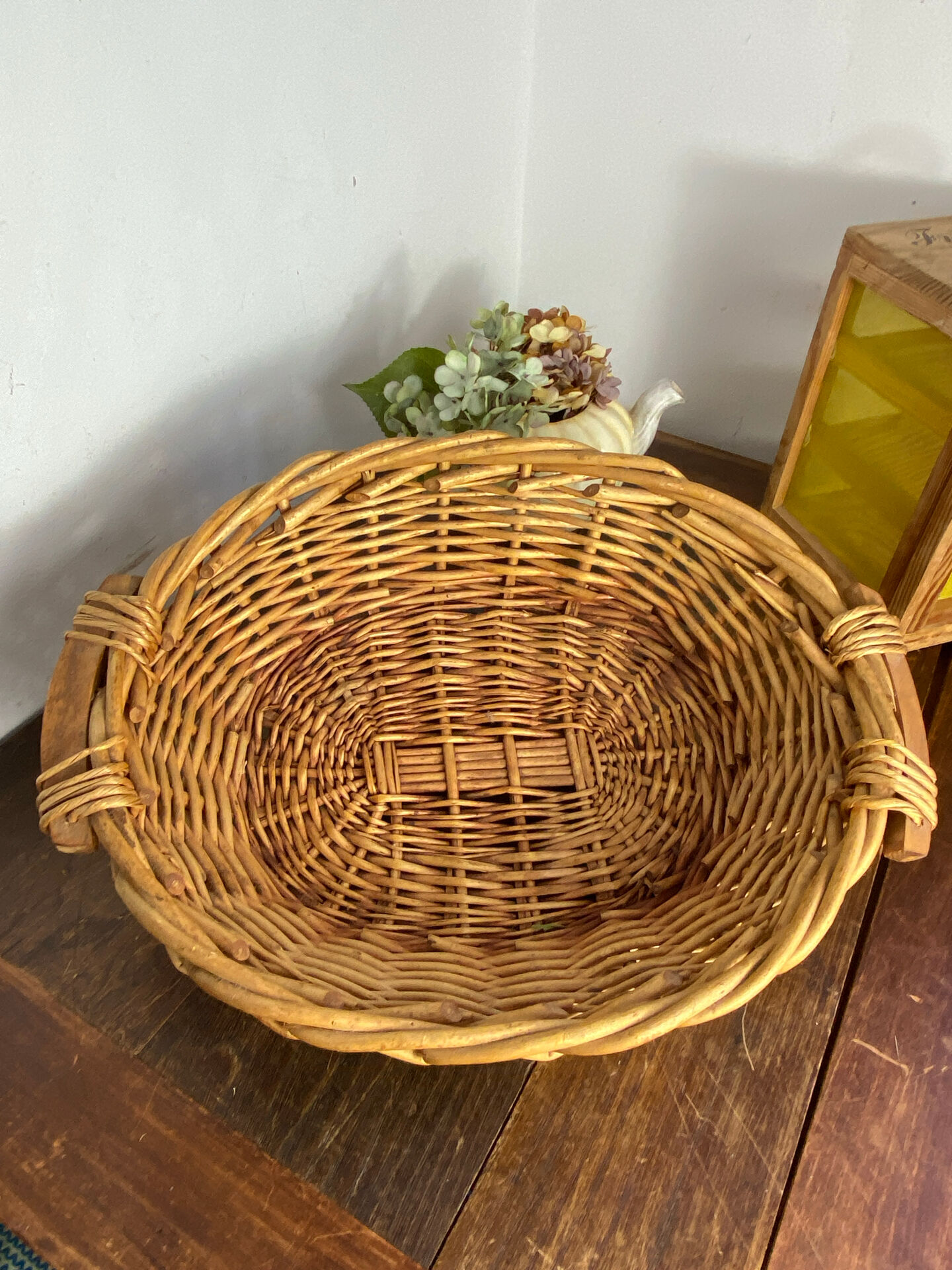 Wicker basket with wooden handles