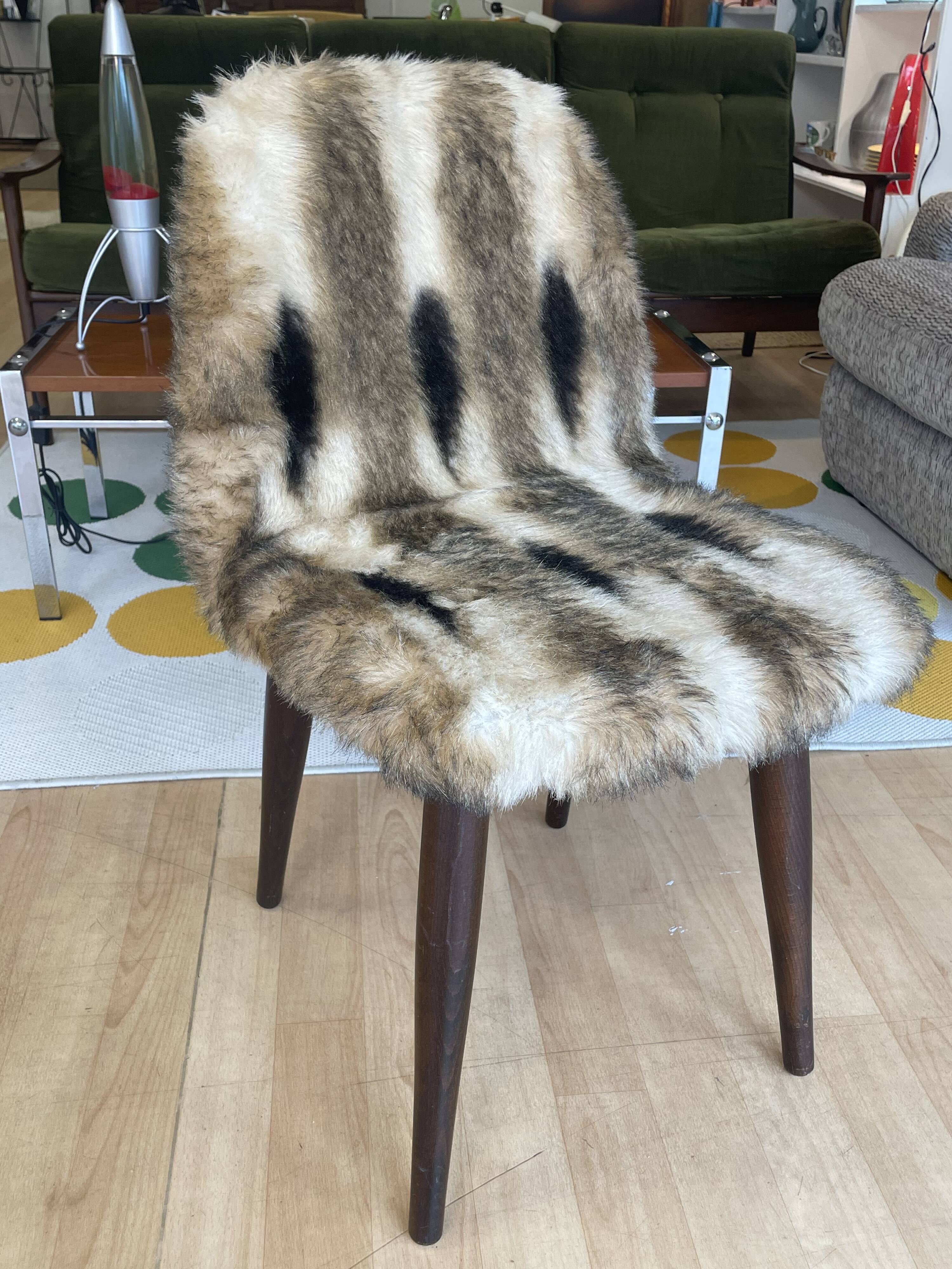 Faux fur chair with patterns & tapered dark wood legs