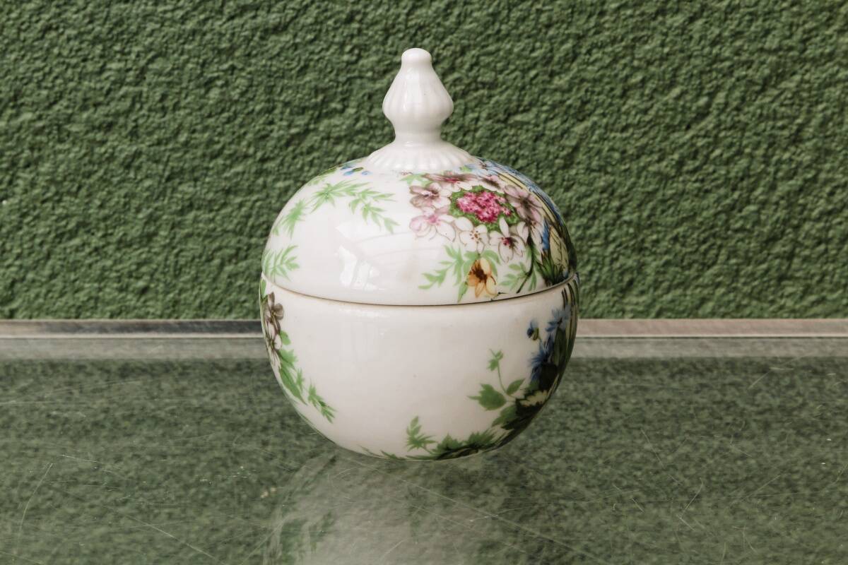 Set of 3 floral porcelain sweet jars from Paris.