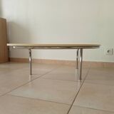 Vintage tripod coffee table in chrome and formica from the 1980s.