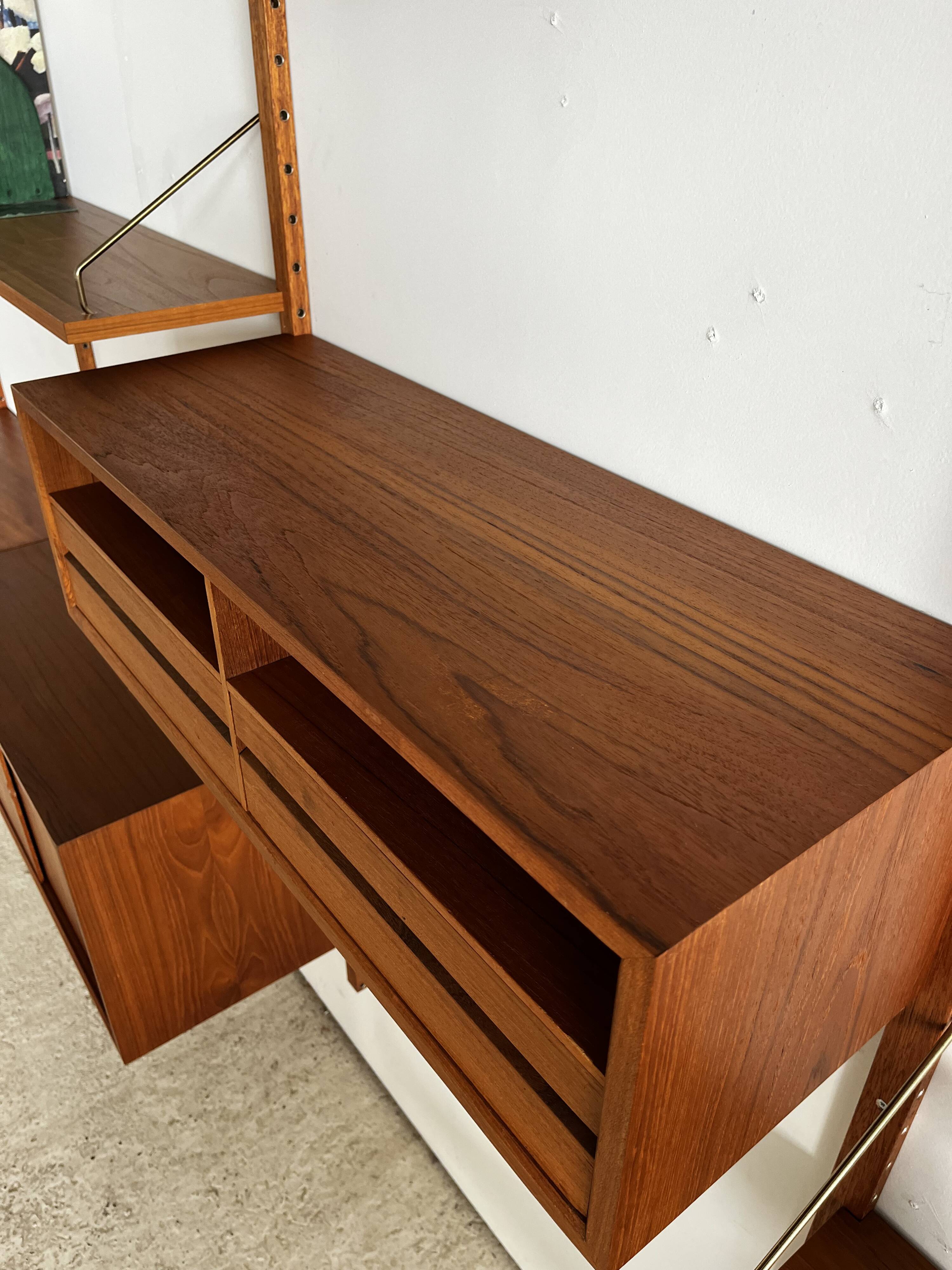 A wall unit with 4 compartments by Poul Cadovius, Denmark, 1960s.