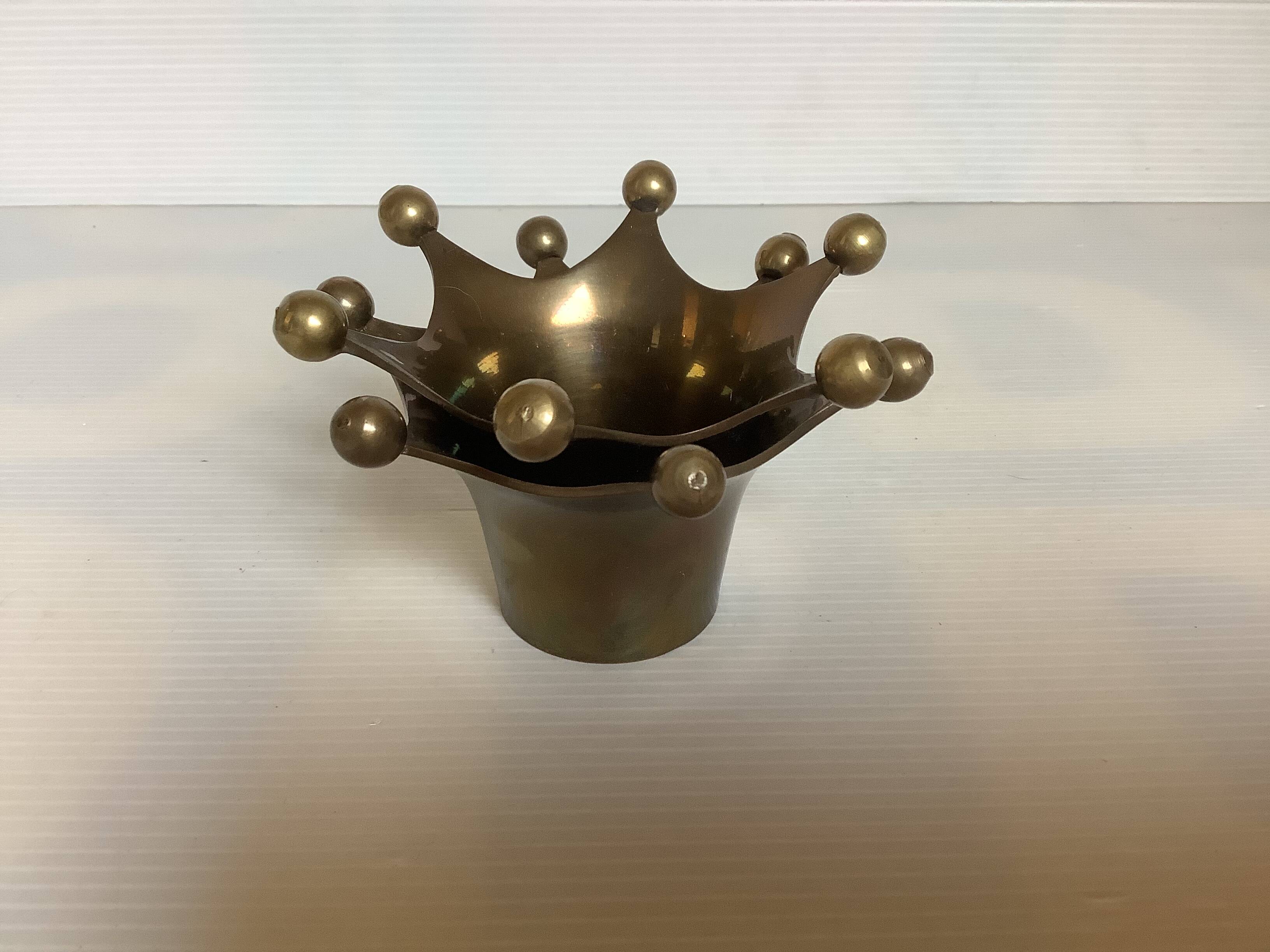 Pair of brass crown candlesticks