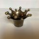 Pair of brass crown candlesticks