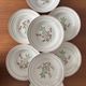 Set of 8 antique deep plates KG Lunéville, floral berry decoration.