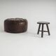 Pouf en cuir vintage