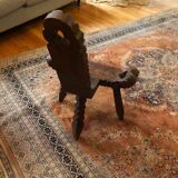 Old tripod milking chair