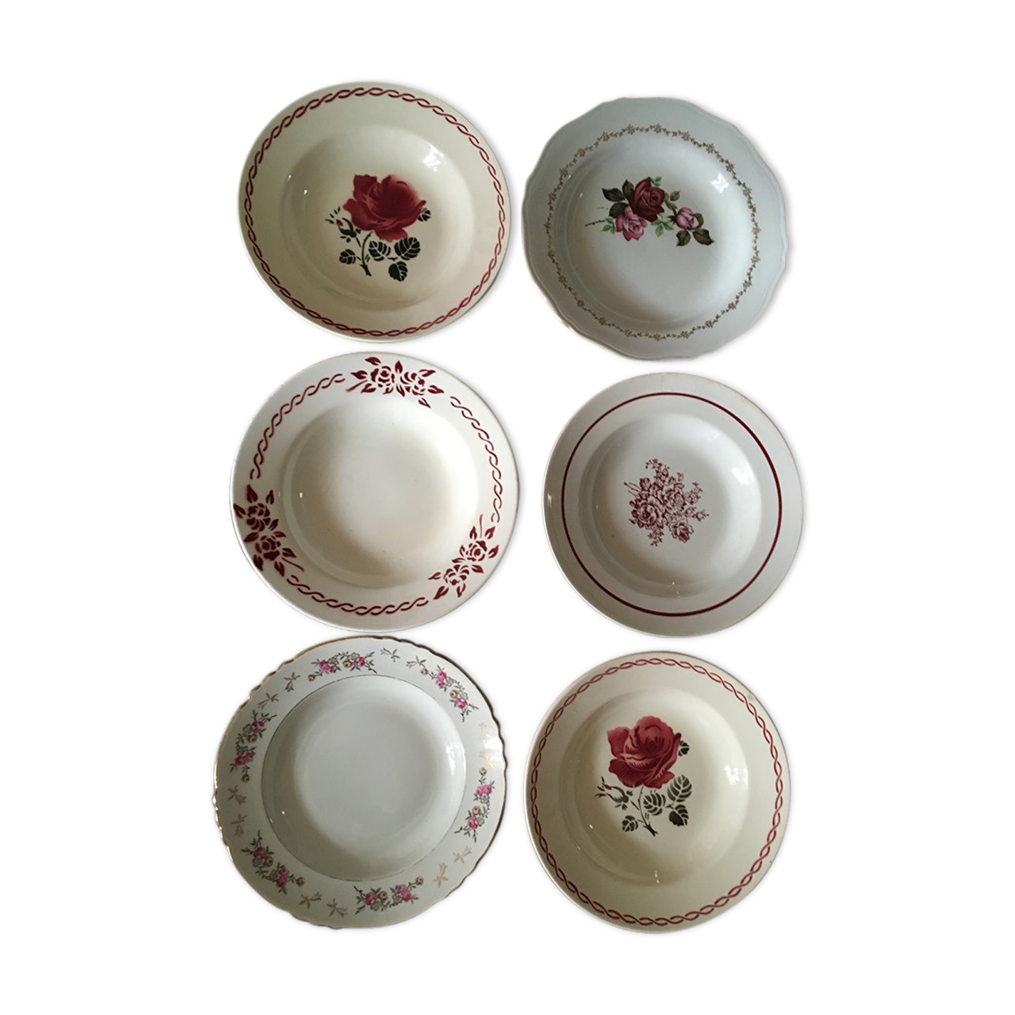 Old hollow plates mismatched ornate in red