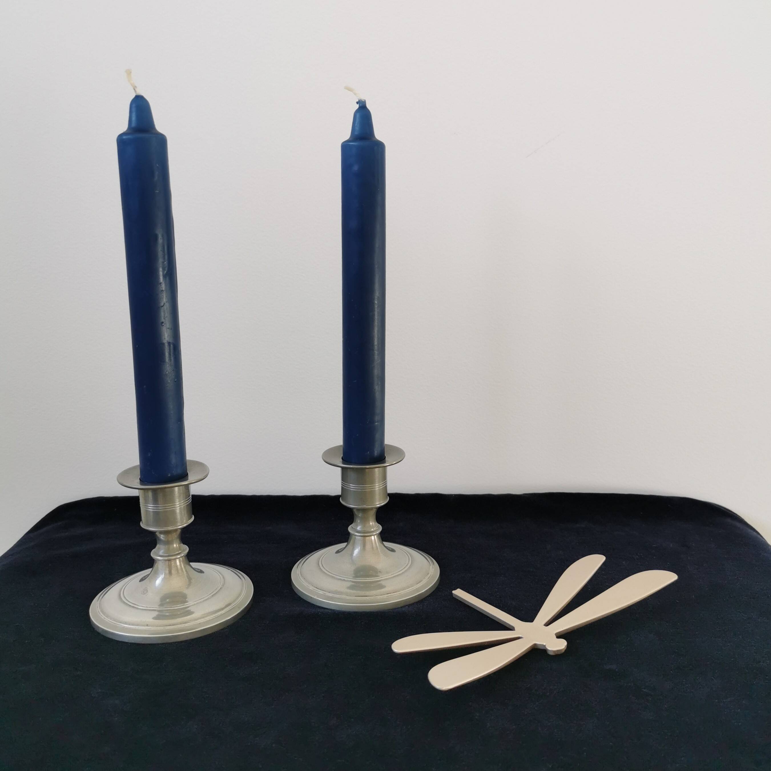 Pair of pewter candlesticks
