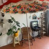 Large floral tilting beach umbrella with cotton fringes, 1960