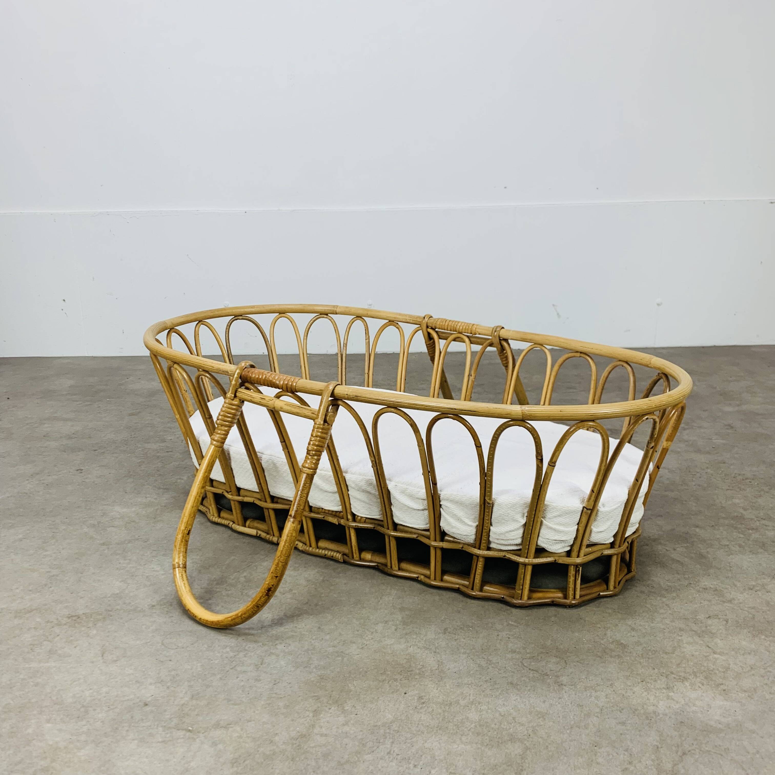Vintage rattan baby bassinet