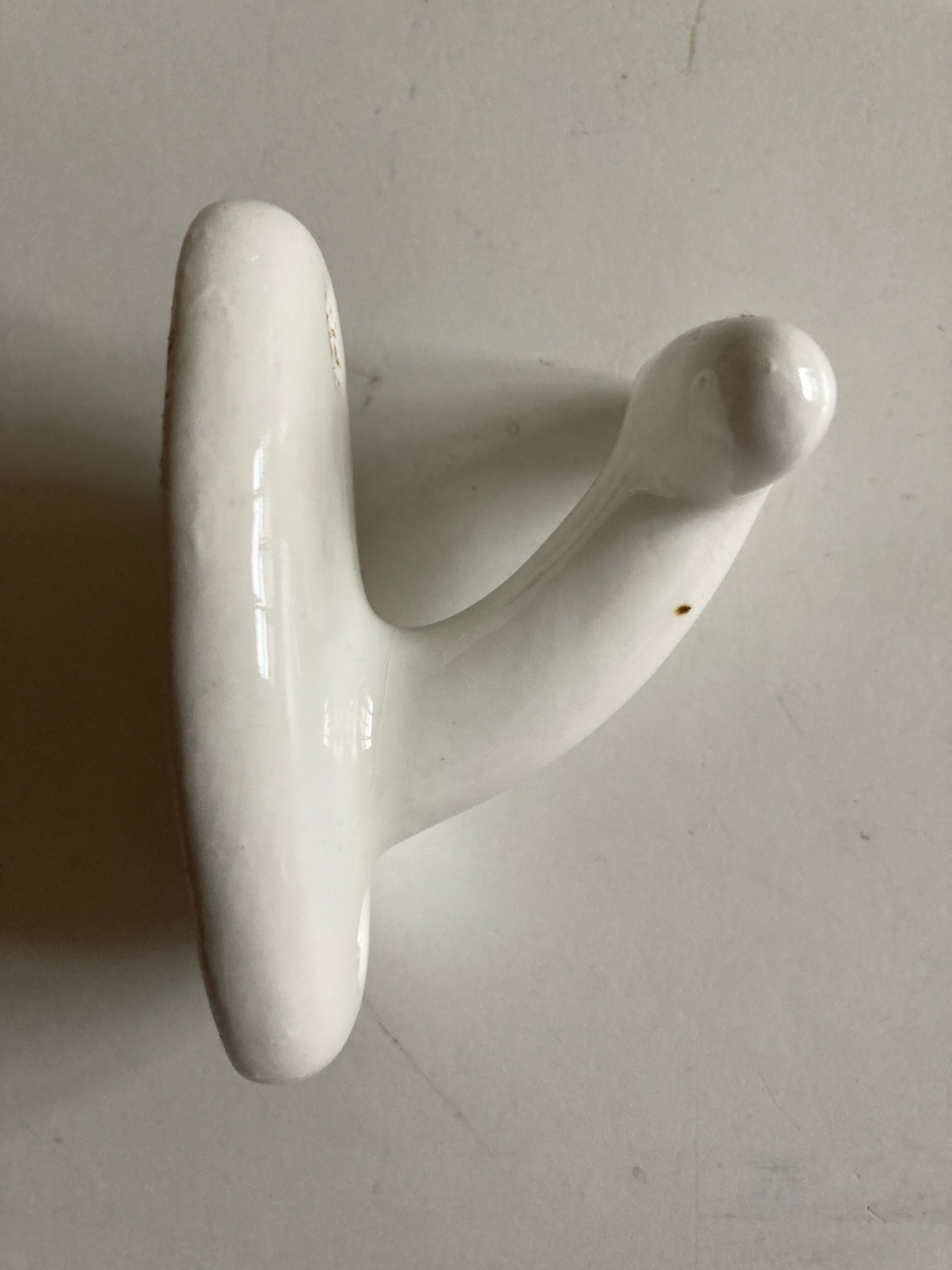 White ceramic bathroom hook 1960s