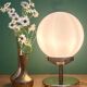Vintage globe table lamp in white opaline.