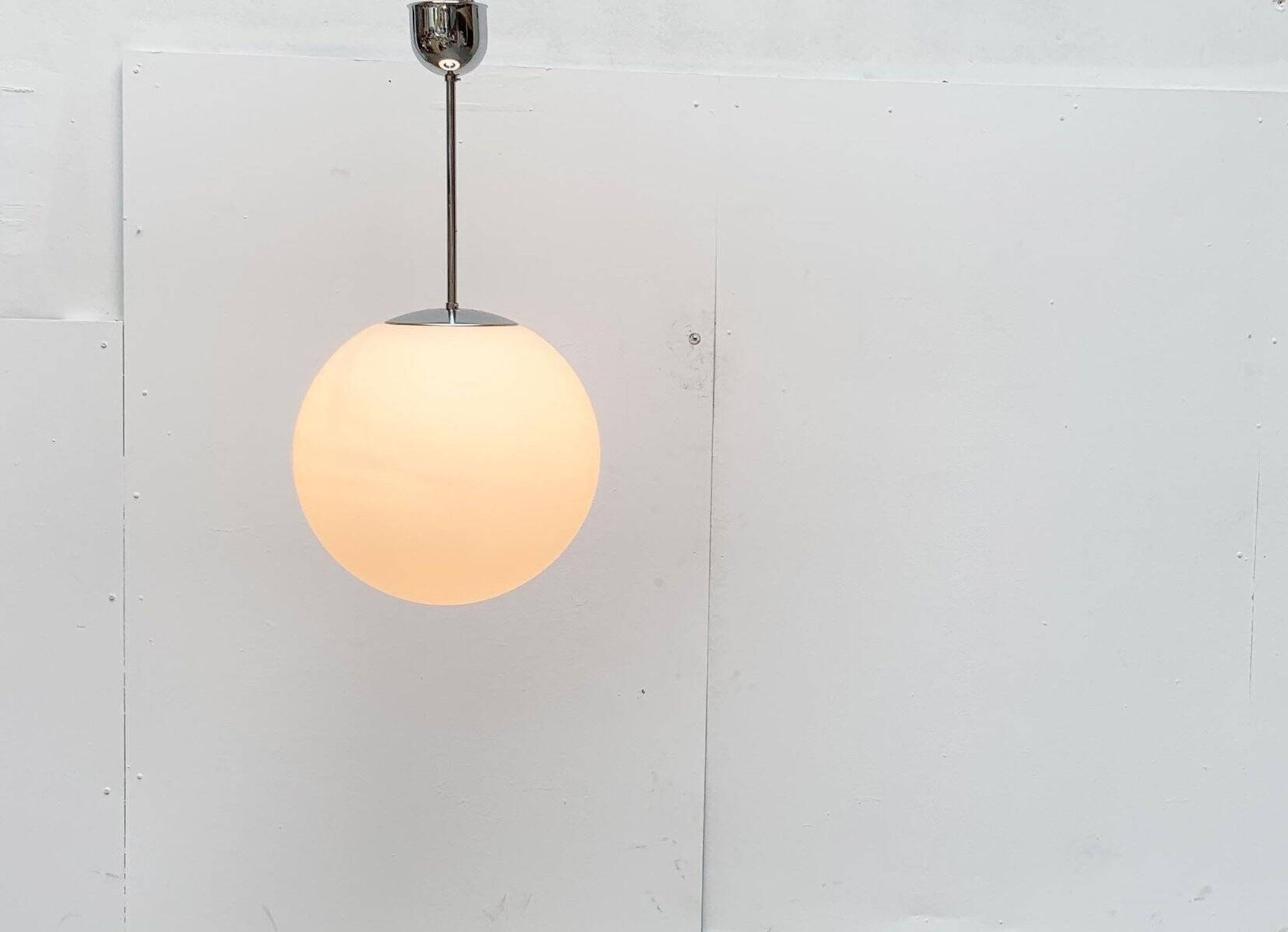 Vintage German space age glass ball pendant lamp by Limburg.