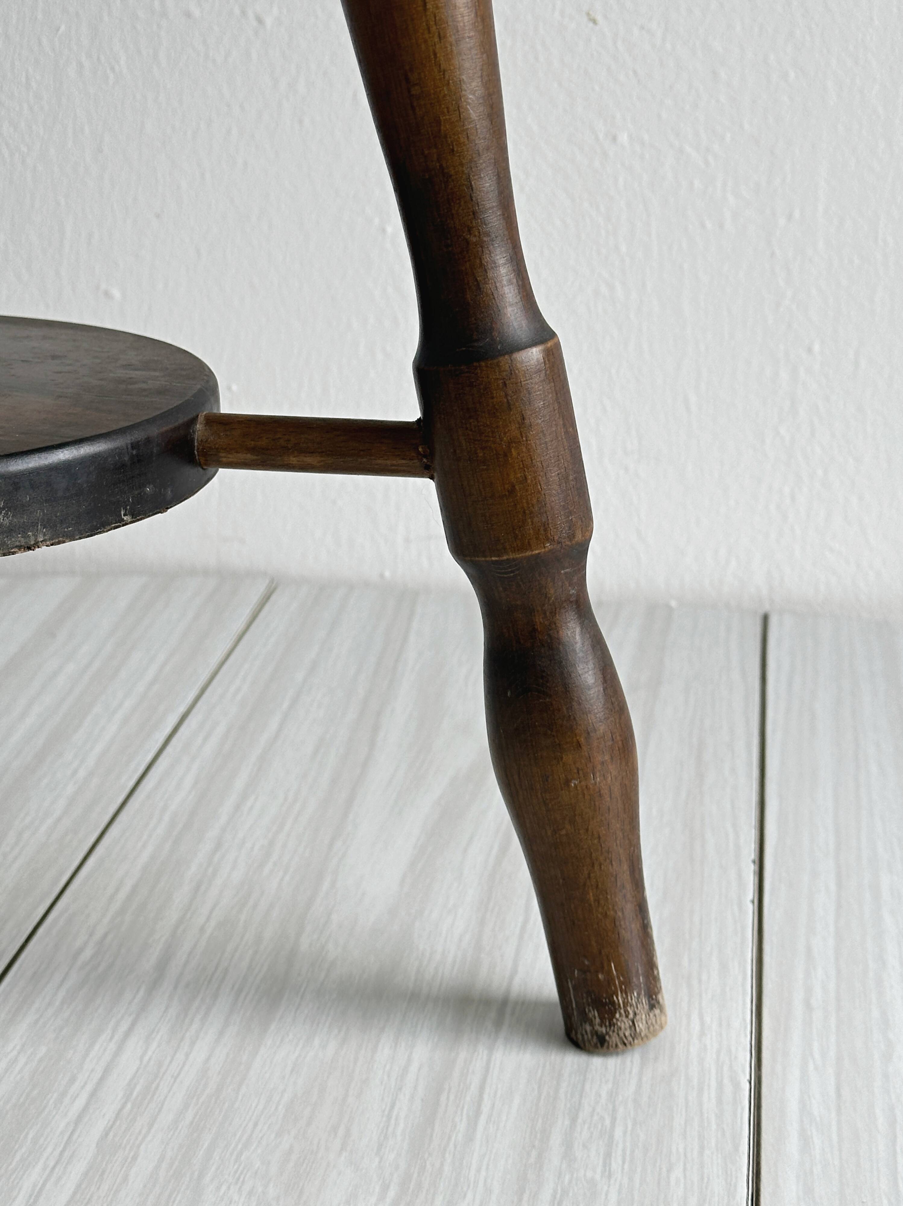 Antique dark wood stool