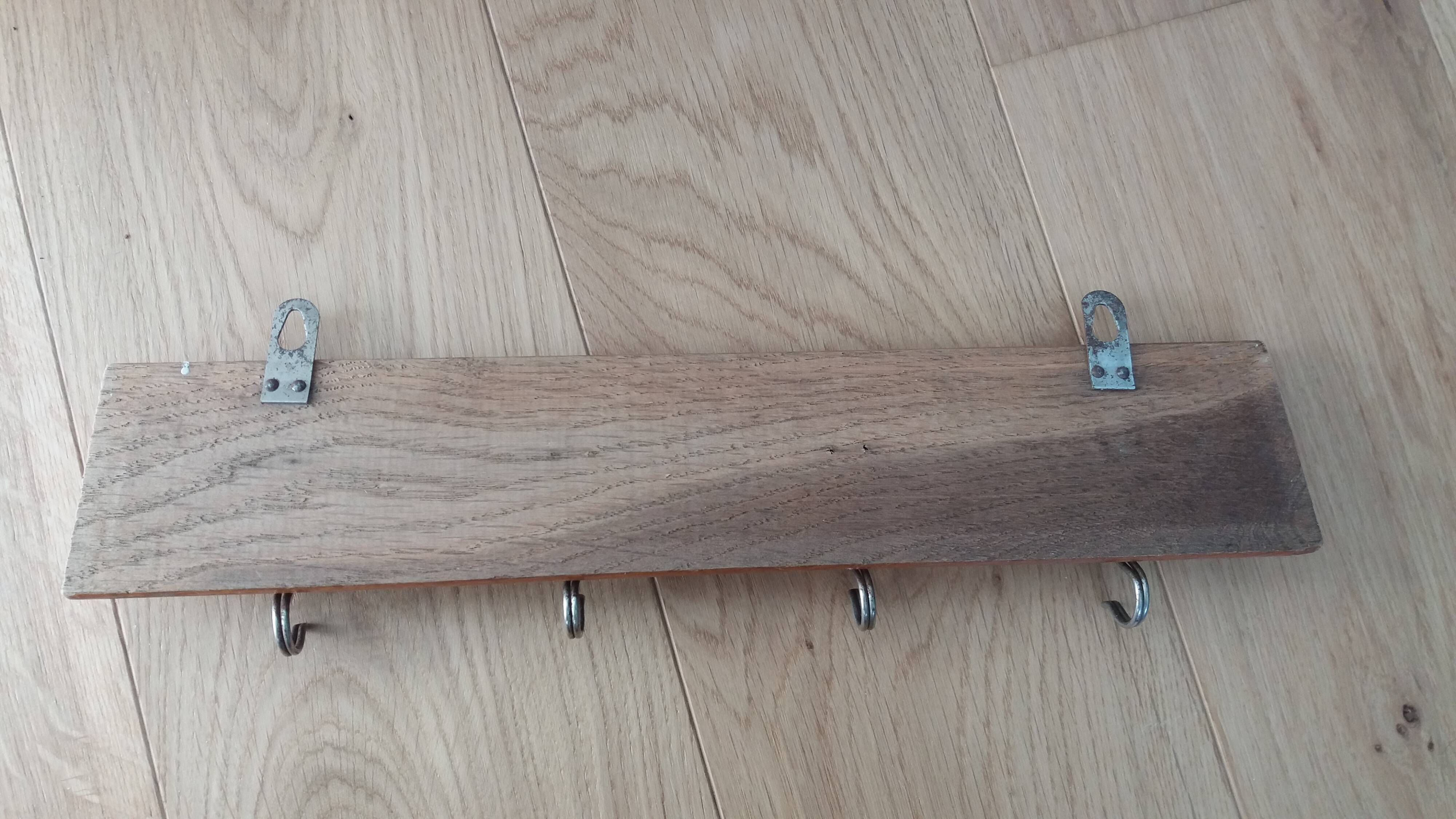 Tea towel holder, wooden and metal towel hook.