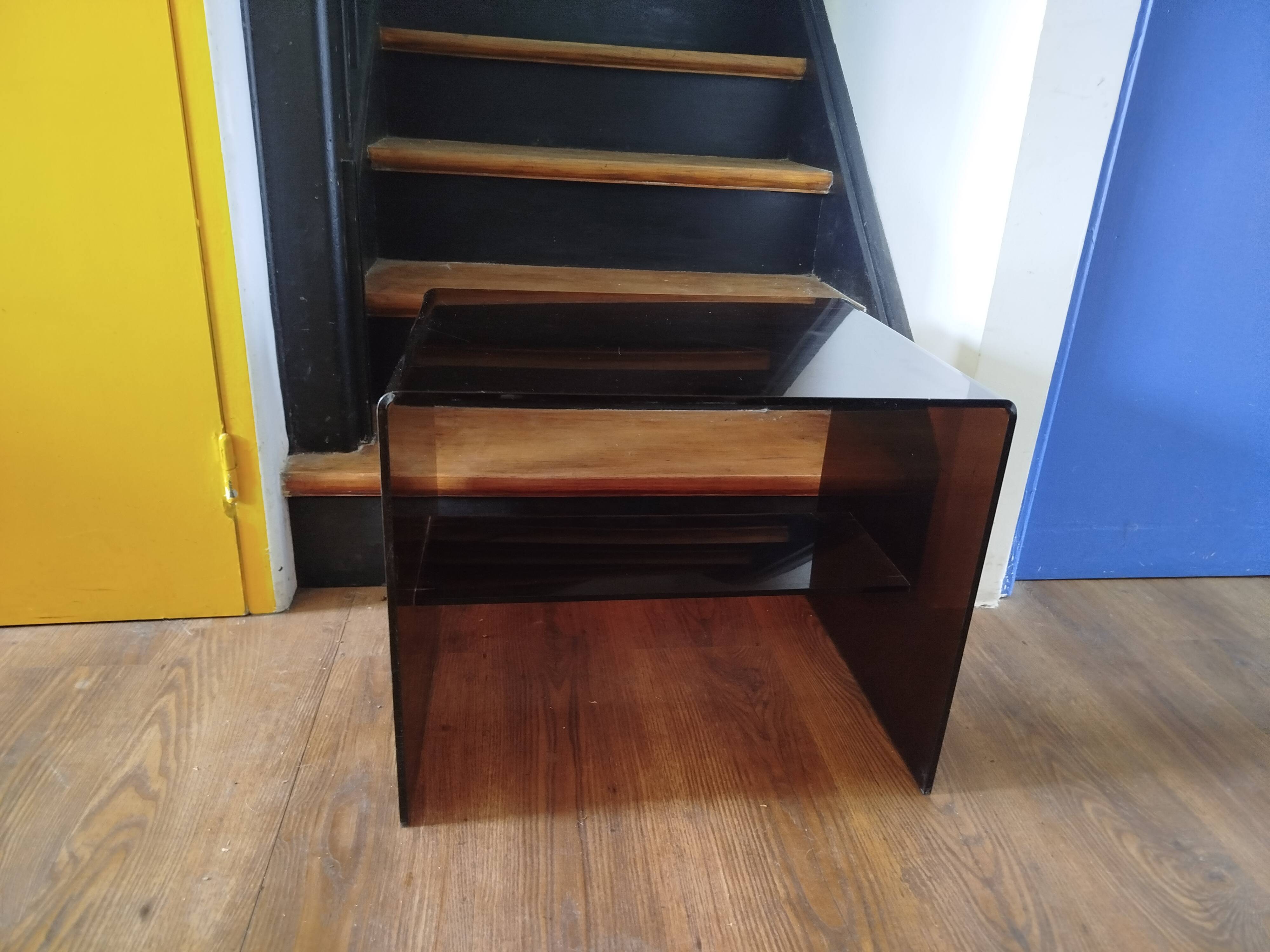 Coffee table / accent piece by Michel Dumas in smoked plexiglass – year