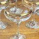 Champagne coupes or cocktail glasses with gilding