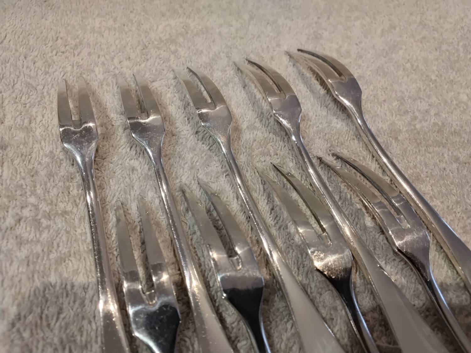 9 silver-plated snail forks by silversmith J Brille, 15.9 cm