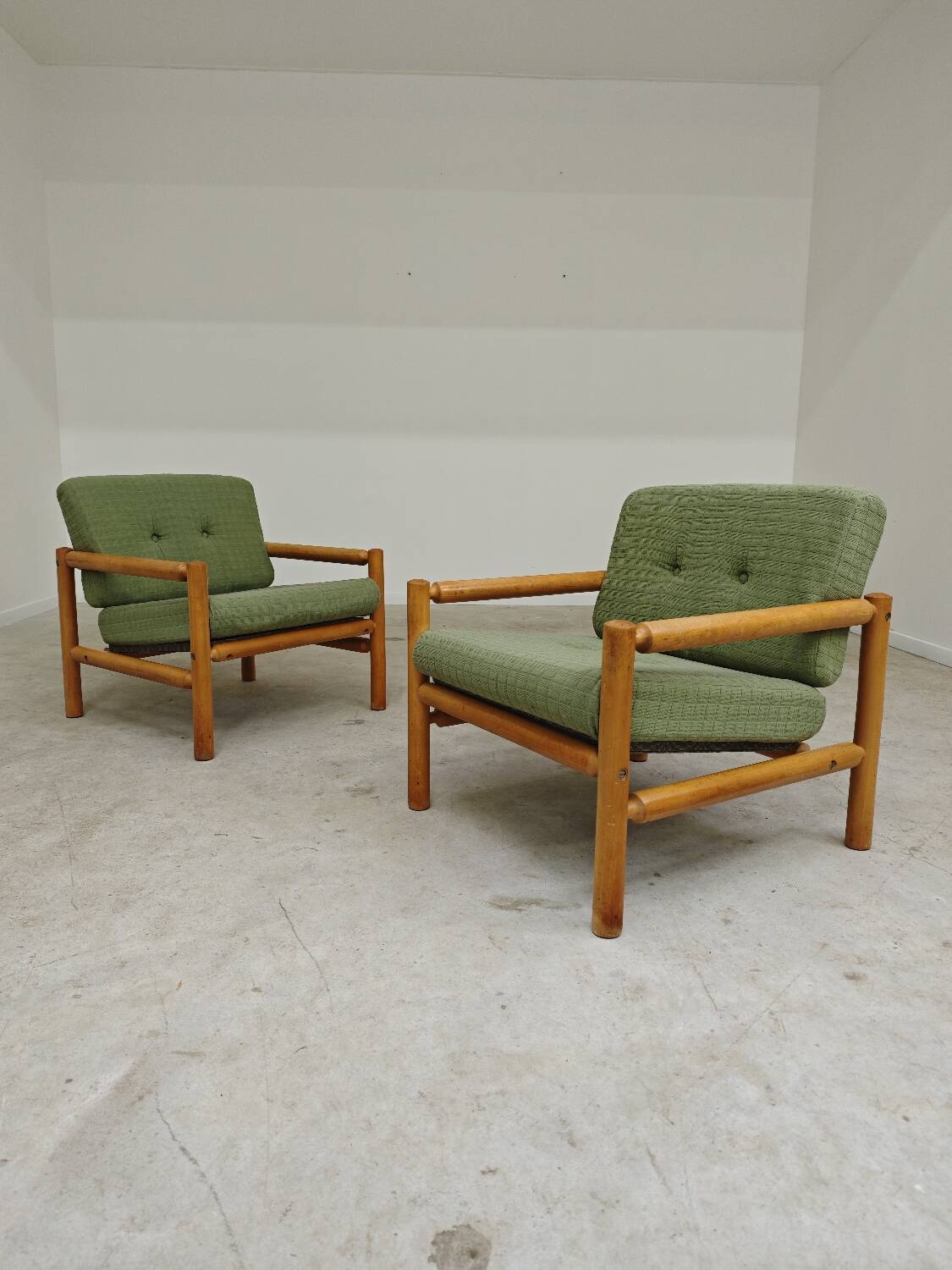 Pair of chalet style armchairs in green fabric