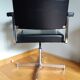 Swivel office chair Strafor with chrome metal and black faux leather.