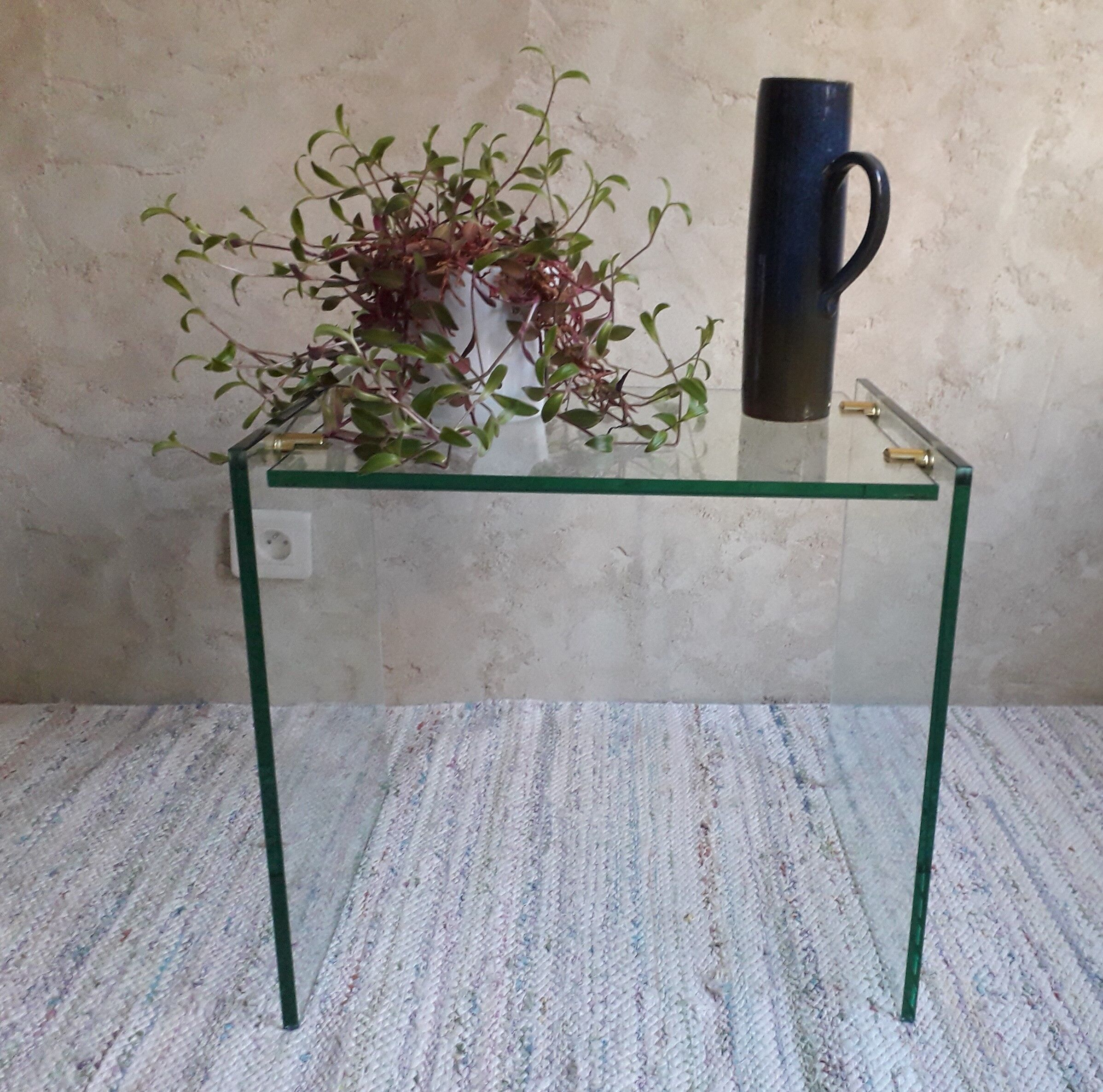Glass and brass coffee table