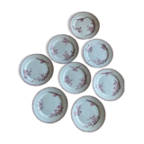 A series of eight flat plates in Terre de fer earthenware, Favori aux oiseaux model - pink tint
