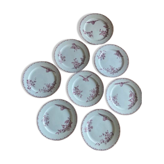A series of eight flat plates in Terre de fer earthenware, Favori aux oiseaux model - pink tint