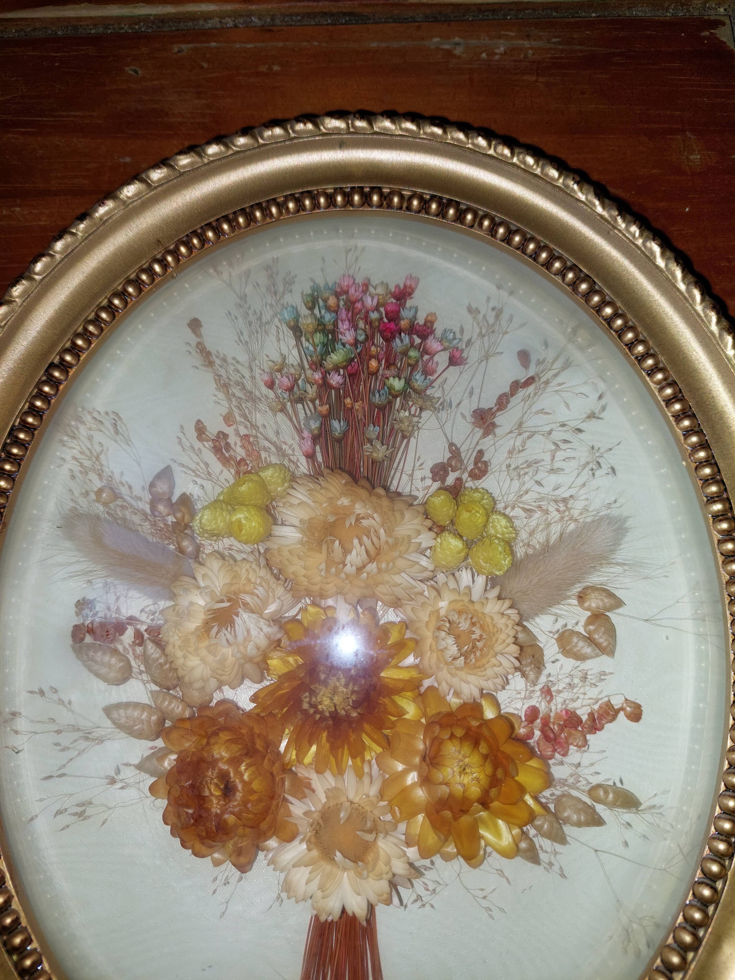 Oval frame domed dried flowers occasion