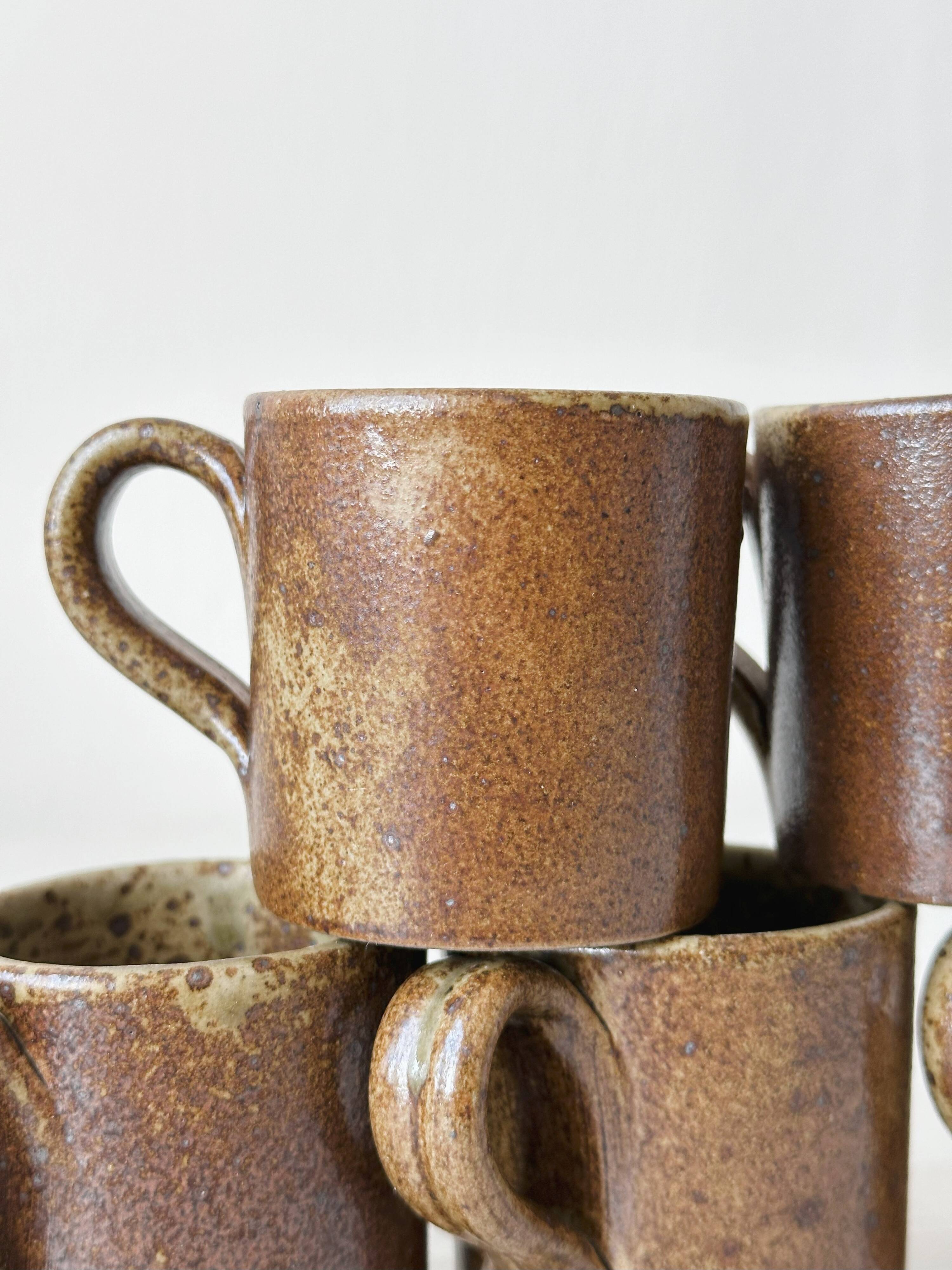 Artisanal pyrite-colored stoneware mugs