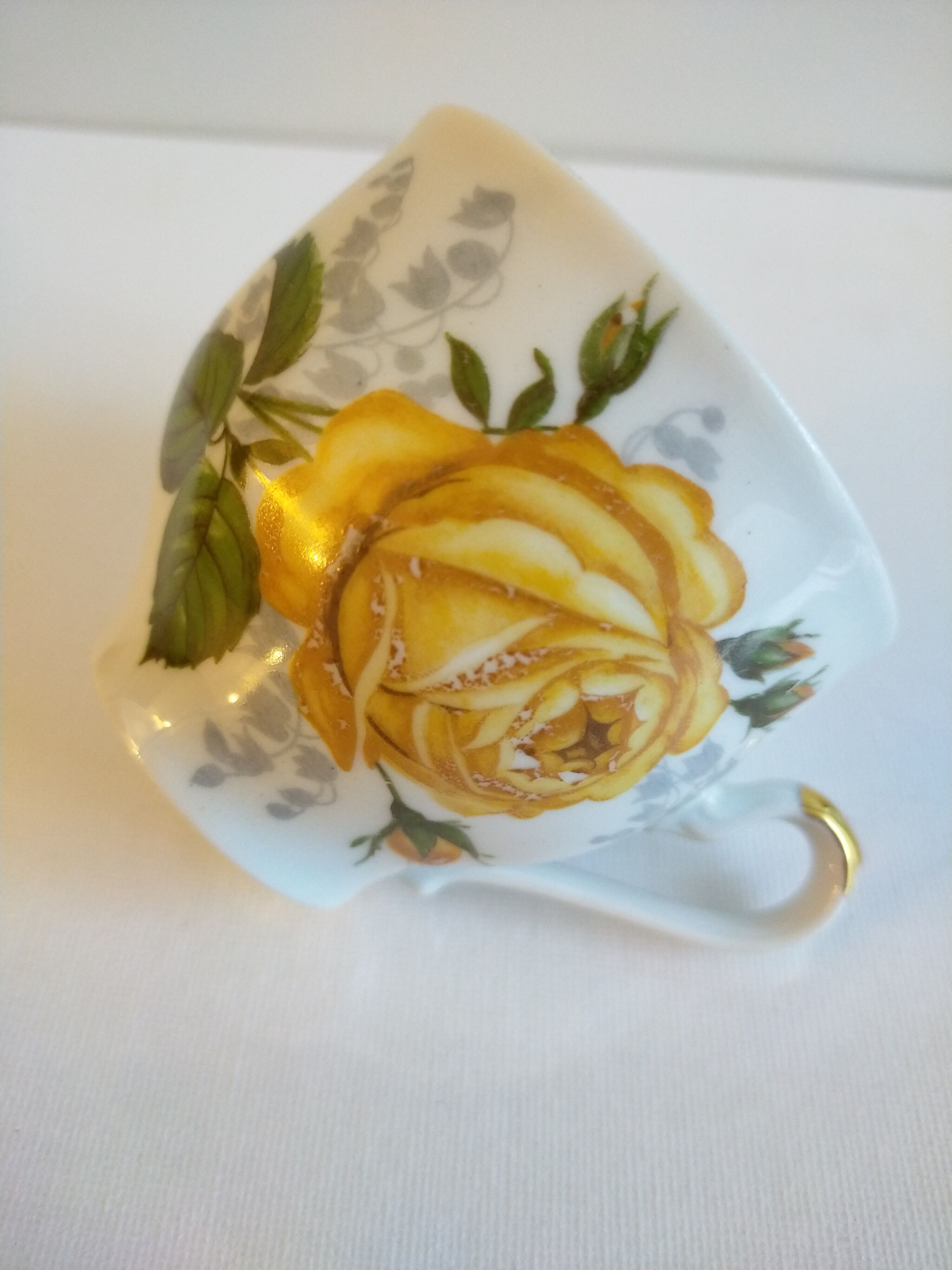 Porcelain cup and under cup