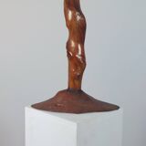 Vintage candle holder in an organic shape with a brass spike and tiered top.