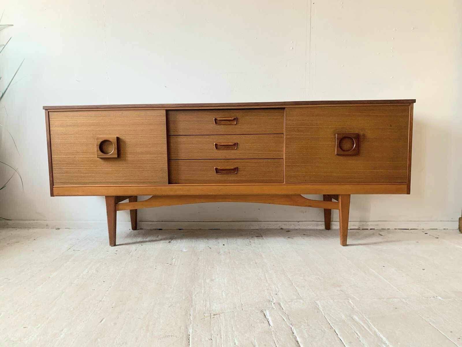 Mid-century teak enfilade, low Scandinavian sideboard from the 1960s with drawers and sliding doors.