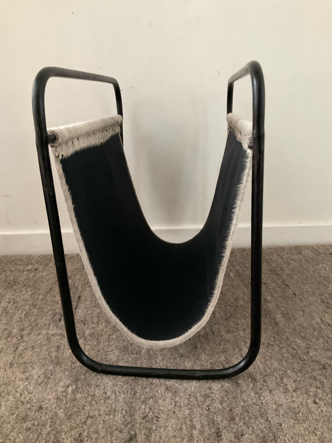 Vintage magazine holder in metal and leather