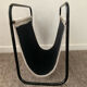 Vintage magazine holder in metal and leather