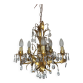 Very pretty chandelier with tassels and leaves in gold sheet metal.