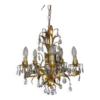 Very pretty chandelier with tassels and leaves in gold sheet metal.