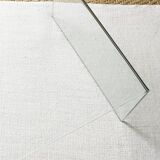 Transparent tempered glass coffee table.