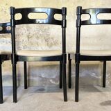Set of six black lacquered wooden chairs.