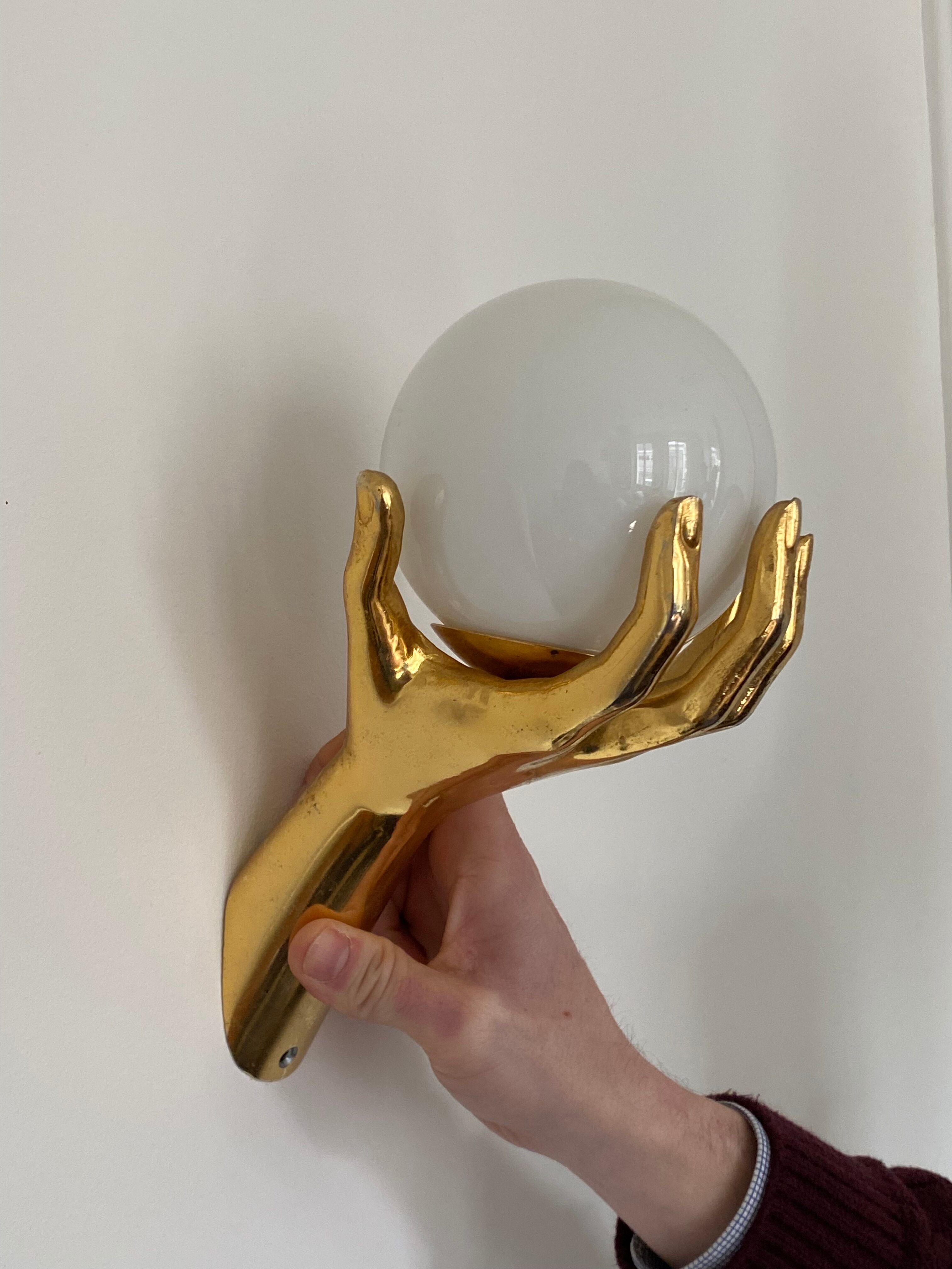 Pair of Arlus hand sconces