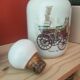 Porcelain carafe with antique decorations
