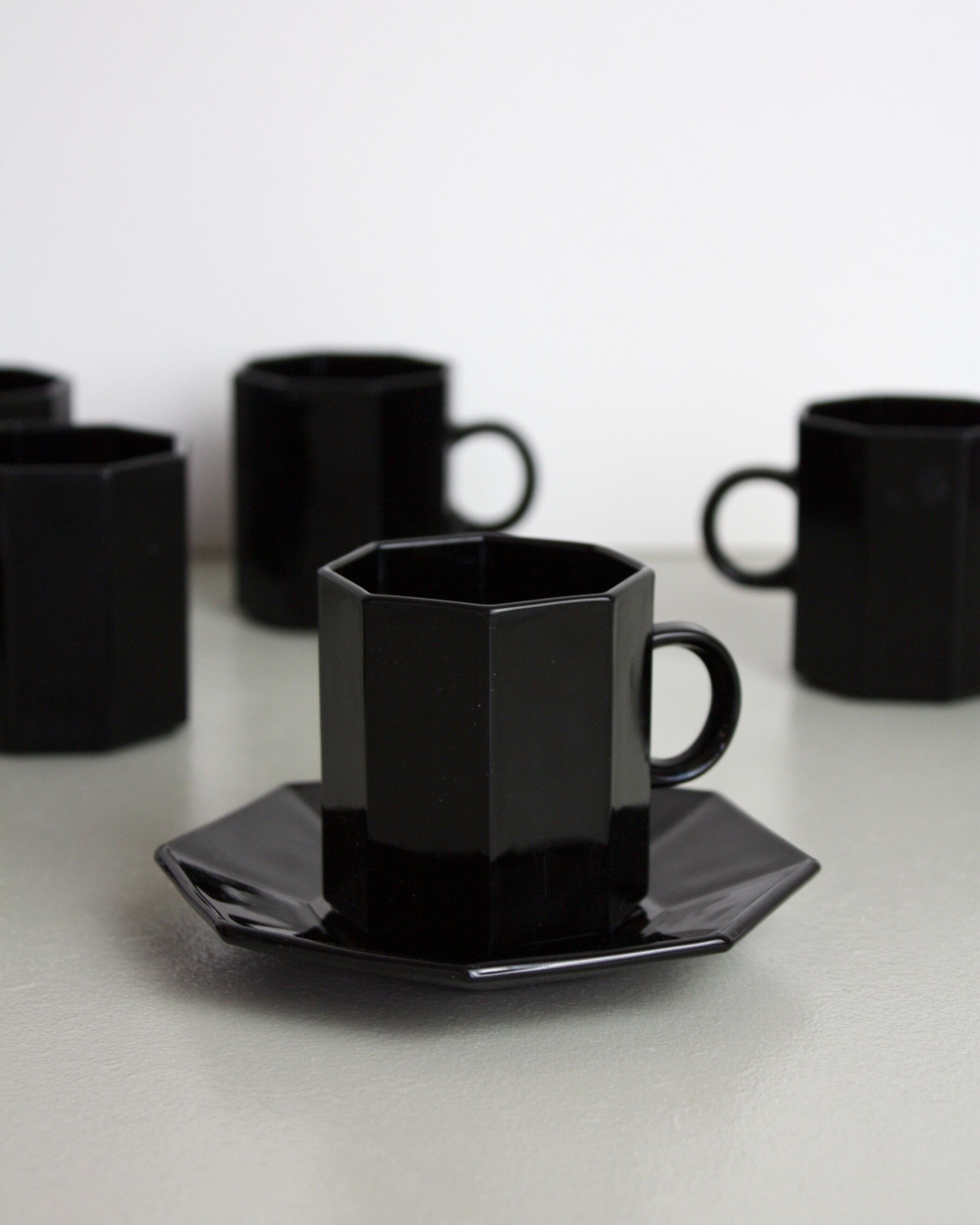 7 black cups Octime Arcoroc Esso collection