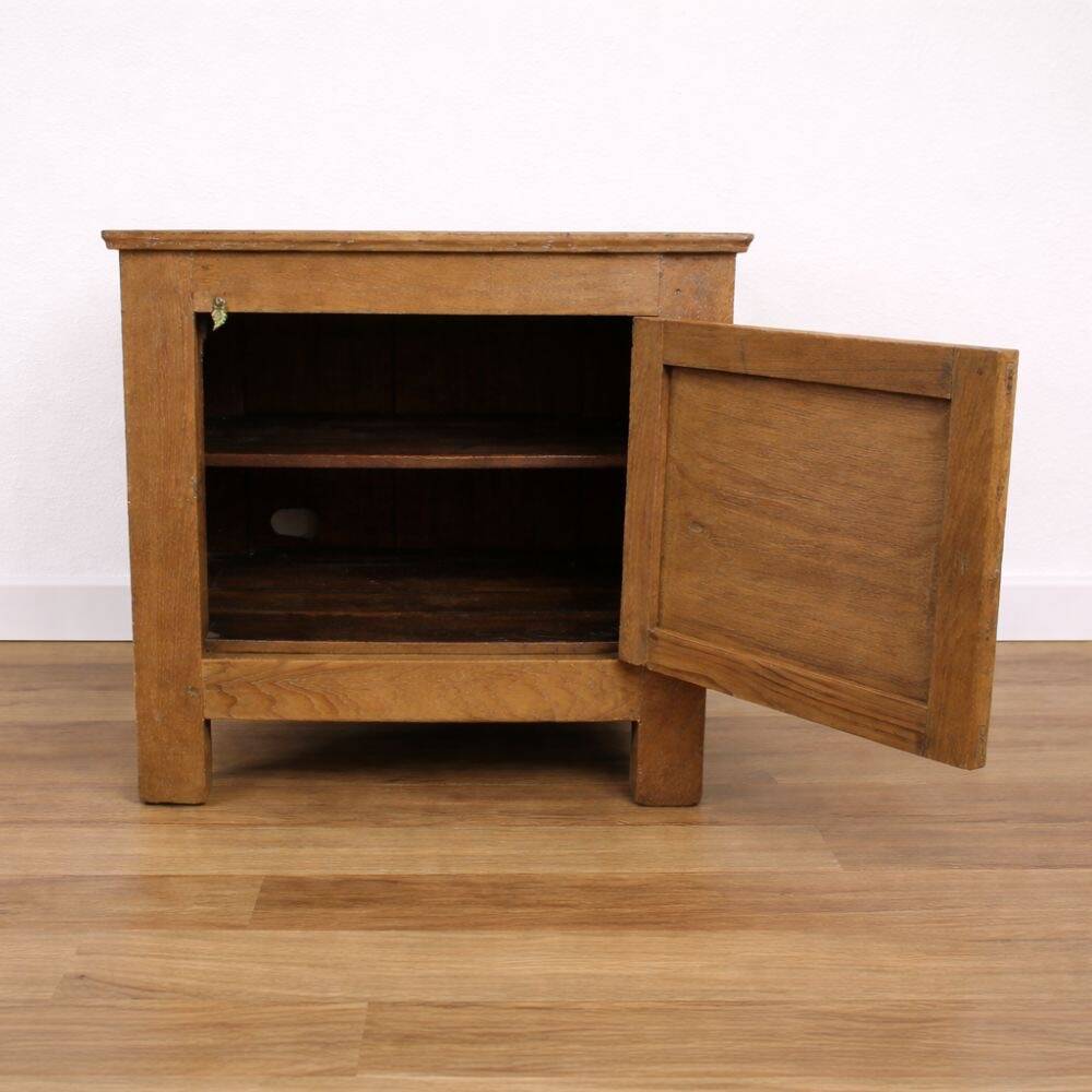 Oak side cabinet with carved motifs