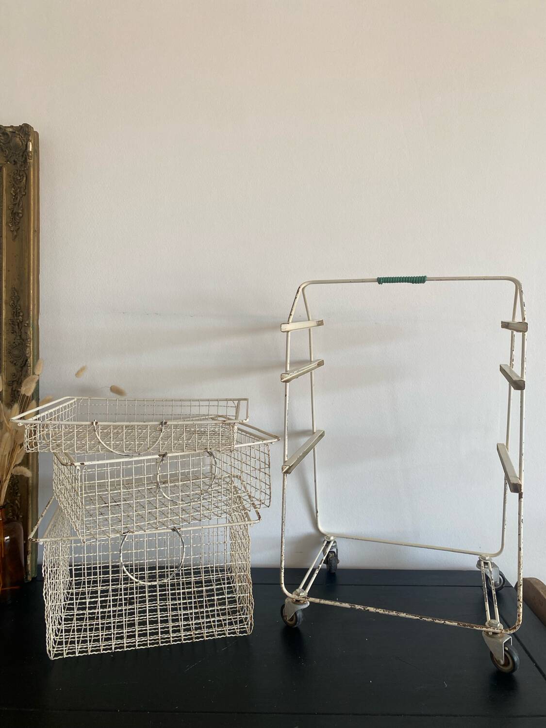 Metal serving trolley on wheels