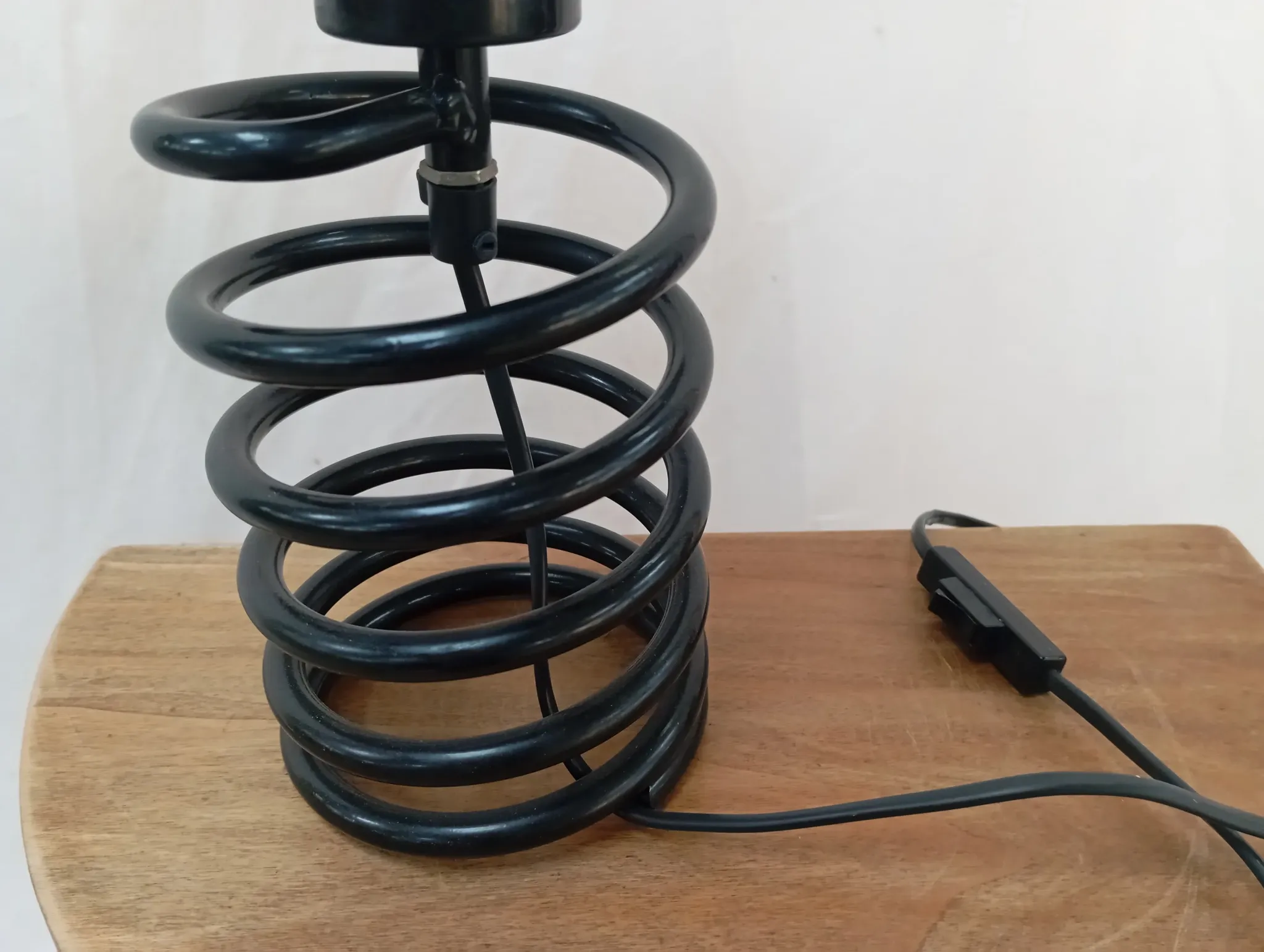 Spring lamp from the 1980s, design by Ingo Maurer.