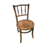 Antique children's chair in curved wood