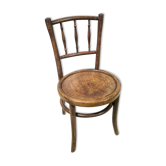 Antique children's chair in curved wood